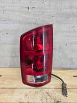 2003-2006 Dodge Ram 3rd Gen 1500 2500 3500 LH Driver Side Tail Light 55077117