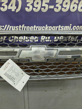 2003-2006 Chevrolet Silverado 1500 2500 3500 HD 'Cateye' Grill OEM - Chrome
