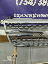 2003-2006 Chevrolet Silverado 1500 2500 3500 HD 'Cateye' Grill OEM - Chrome
