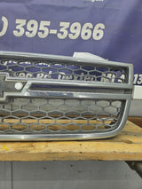 2003-2006 Chevrolet Silverado 1500 2500 3500 HD 'Cateye' Grill OEM - Chrome