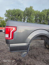 2015-2020 Ford F150 8' Long Bed Without Wheel Lip Molding - Magnetic Grey *Damage
